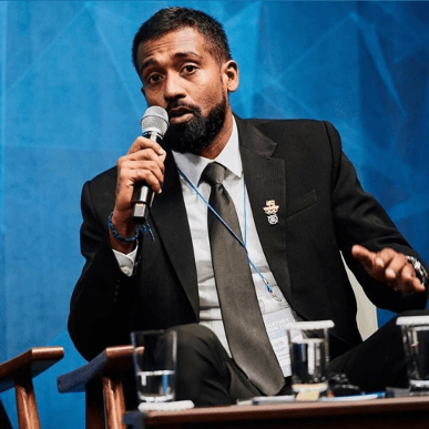 Sivarajah Gobinath speaking about the Sport for Peace at the DT Seoul Forum 2018